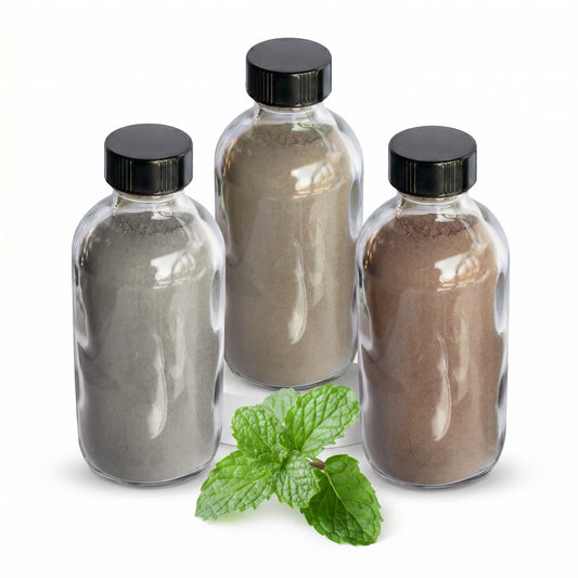 Calm & Clarity hapé bundle — Limpeza Astral, Menta and Mulungu rapé bottles with a sprig of mint